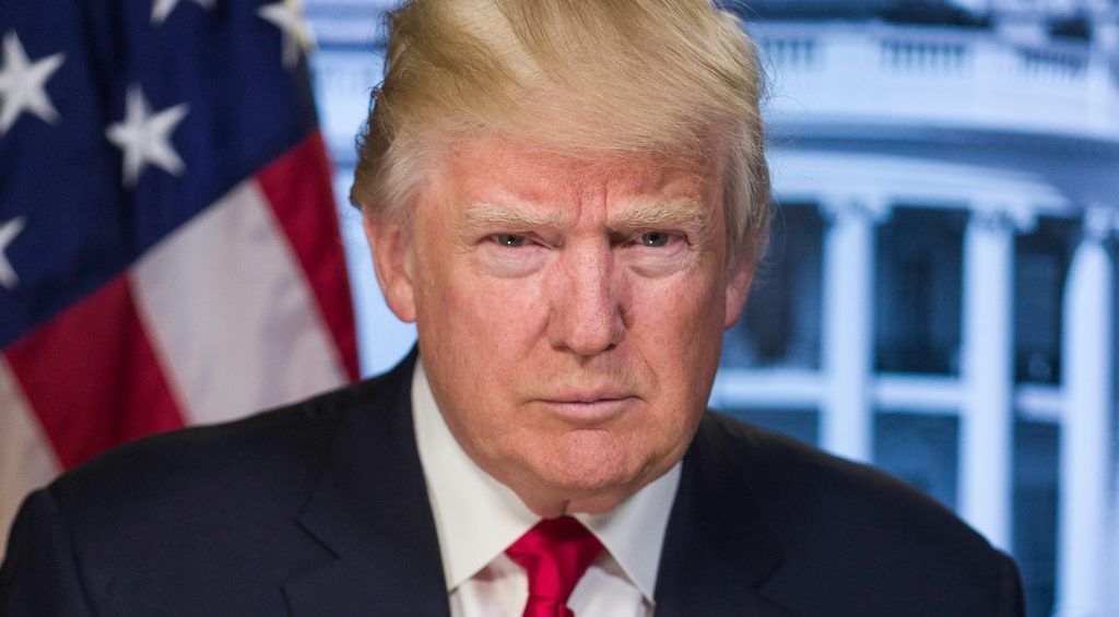 Donald Trump speaking at a White House press briefing about Tylenol use in pregnancy and childhood vaccination policy