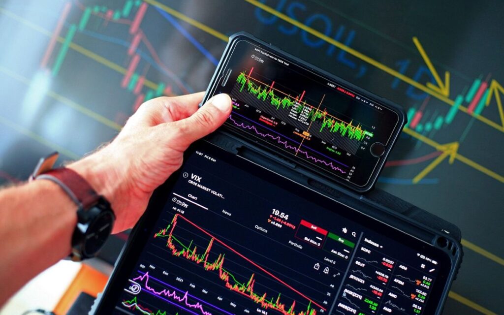 Financial graphs and biotech lab imagery illustrating market fluctuations