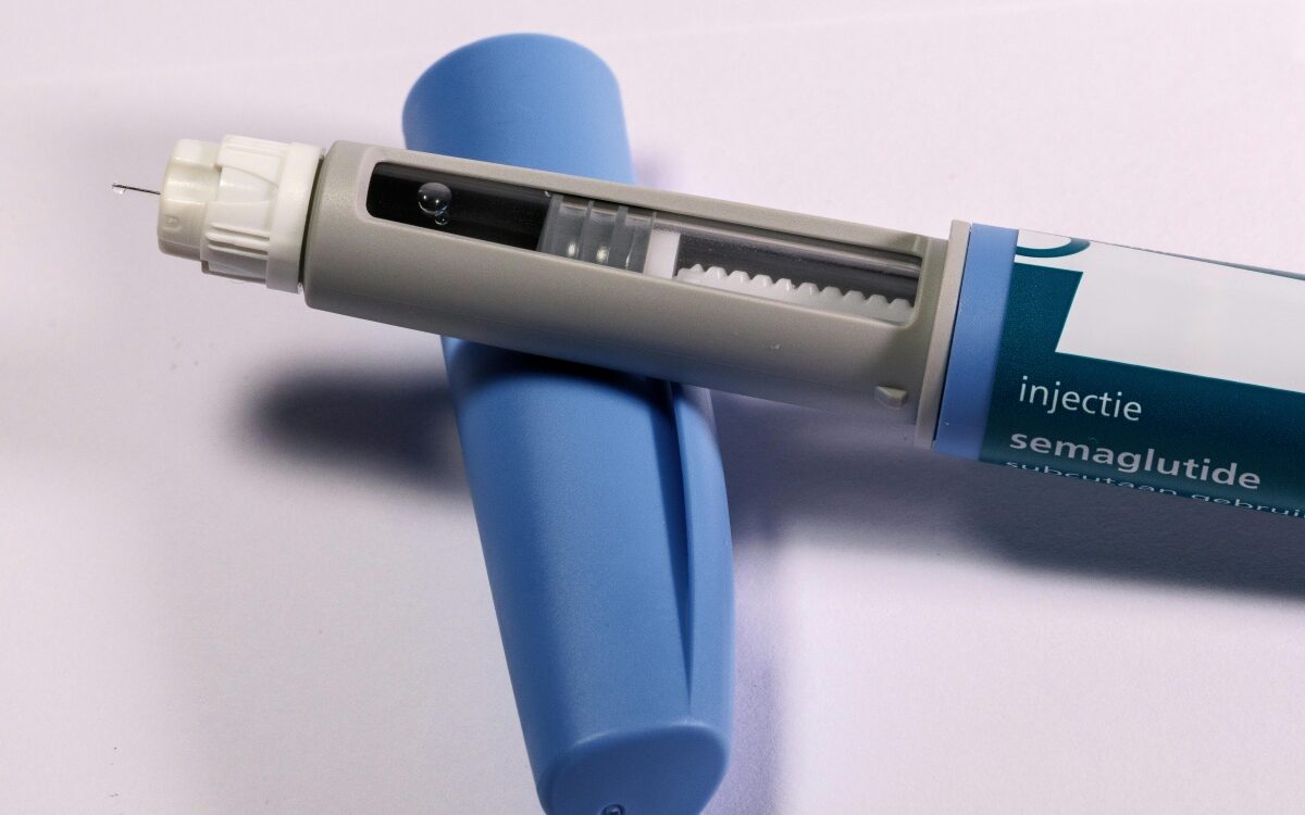 an injection pen containing the drug semaglutide, which is the active ingredient in medications like Ozempic and Wegovy.