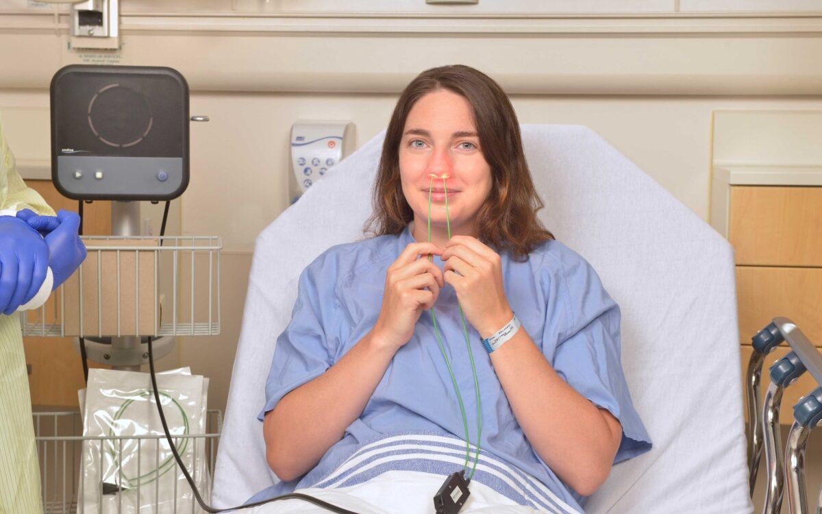 Photodisinfection - woman sitting in hospital bed