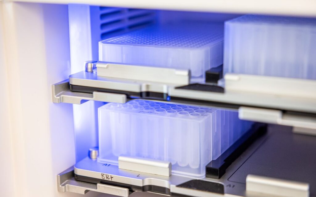 AI drug discovery benchmarking: sample plates in automated laboratory storage unit